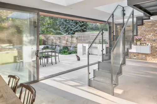 Rose Brentwood Essex Four Storey Refurbishment Contemporary Basement Extension glass box Staircase Alfreso Dining Garden Landscape