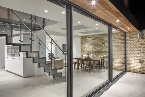 Rose Brentwood Four Storey Refurbishment Contemporary Basement Extension Staircase Open plan kitchen diner Bifold Doors