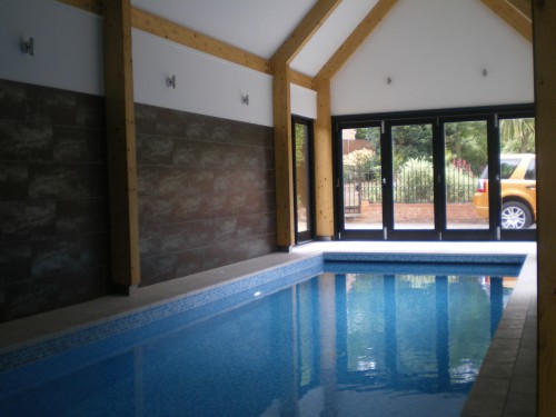 Little Meadhams Old Harlow Grade II Listed Extension Swimming Pool timber glulam portal frames