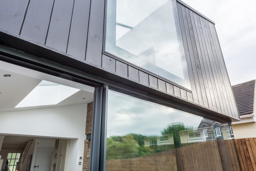 Mill Lane Stock Contemporary Extension Natural light vaulted glazed gable end black timber cladding