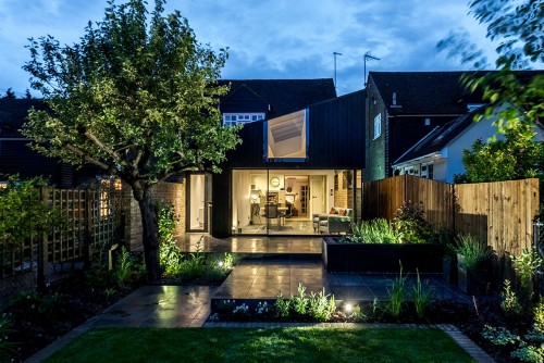 Mill Lane Stock Contemporary Extension frameless glass single entrance sidling door Garden Lansdscape