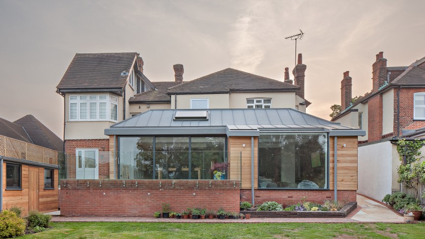 Hall B Upminster Contemporary Extension Zinc Roof Full Height Glazing Garden Landscape full view