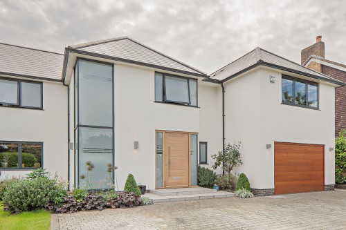 Bowhay Hutton Mount Shenfield Contemporary Extensions and Refurbishment Render Finish Front of House View with Garage