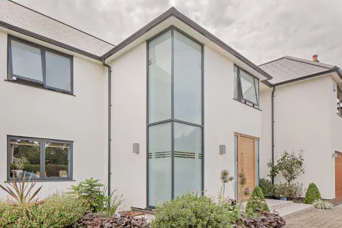 Bowhay Hutton Mount Shenfield Contemporary Extensions and Refurbishment full height glazed Frameless Glass Corner Window