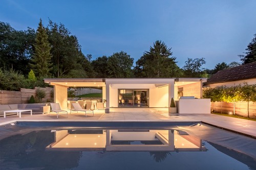 Well Lane Langdon Hills Essex Residential outer building swimming pool decking Garden landscape Night view