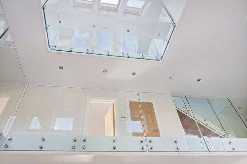 Noodles Hutton Mount Shenfield 645m New Build Hybrid Design Home stunning hallway entrance glass stairway gallery glass landing