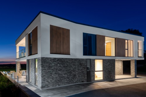 North Tye Swanley New Build Contemporary Home corner front view grey stone cladding