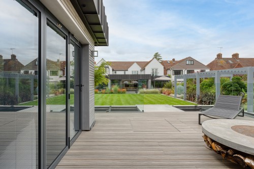 Worrin Shenfield Contemporary Single Storey Extension Outbuilding garden landscape bifold doors