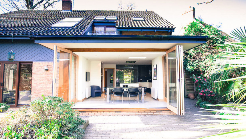 Squirrels Hutton Mount Shenfield Contemporary Extensions hardwood timber bi folding sliding doors