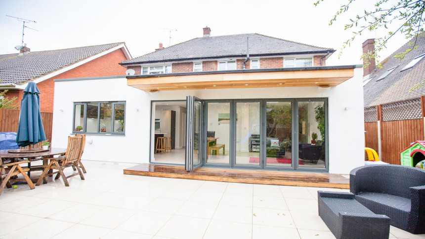 Shenfield Rd Contemporary Extension Open Plan Bifold Doors Grey aluminium powder coated windows western red cedar timber clad soffit canopy