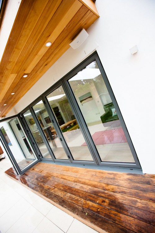 Shenfield Rd Contemporary Extension Open Plan Sliding Bifold Doors western red cedar timber clad soffit canopy